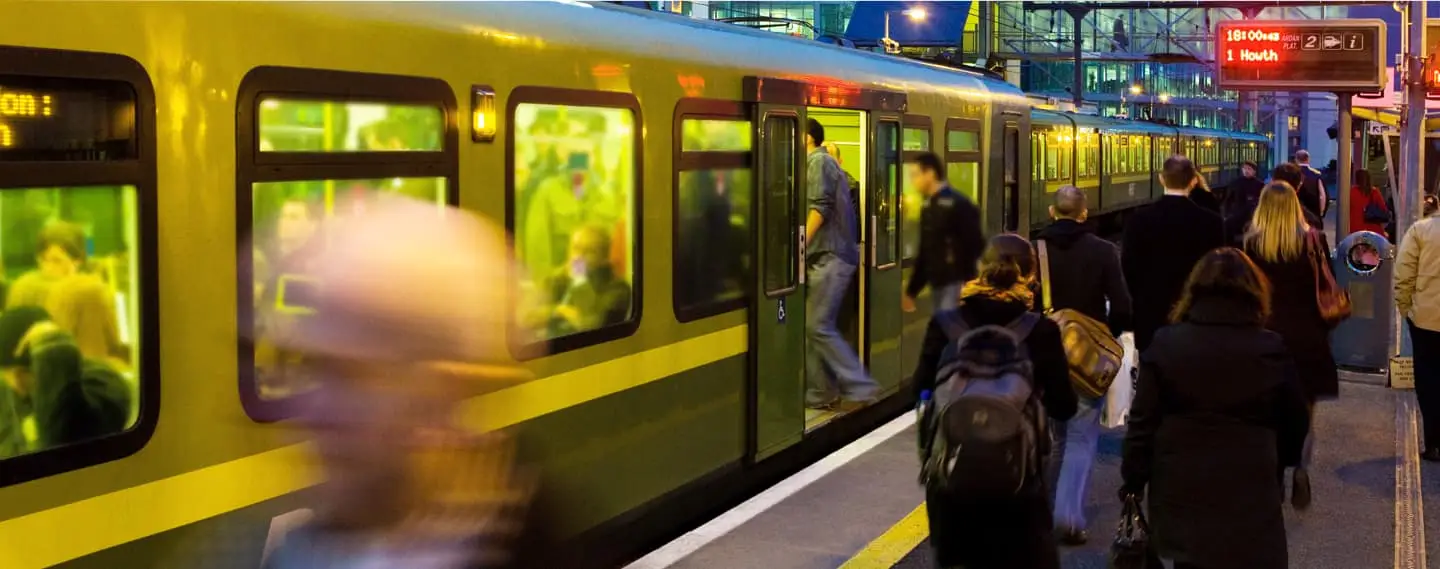 People boarding a train at the Grand Canal Dock Station in Dublin